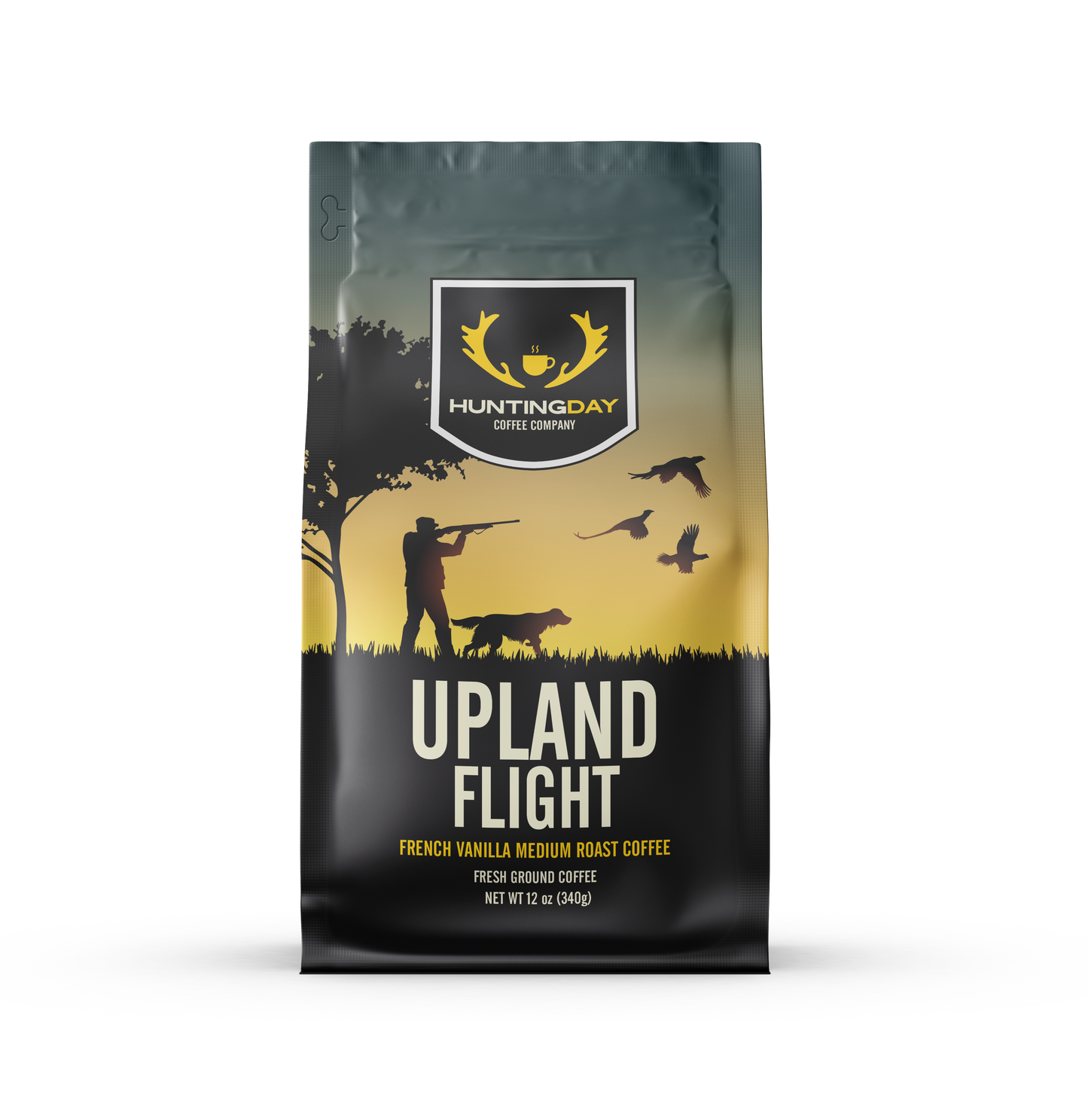 A bag of Huntingday Coffee Company Upland Flight French Vanilla Medium Roast Coffee, featuring a black and yellow graphic design with a hunting silhouette and birds.