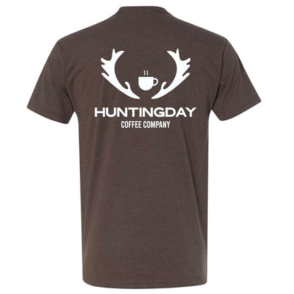 A dark brown heather short-sleeve t-shirt shown from both the front and back. The front features the white text 'DRINK COFFEE PRAISE JESUS'.