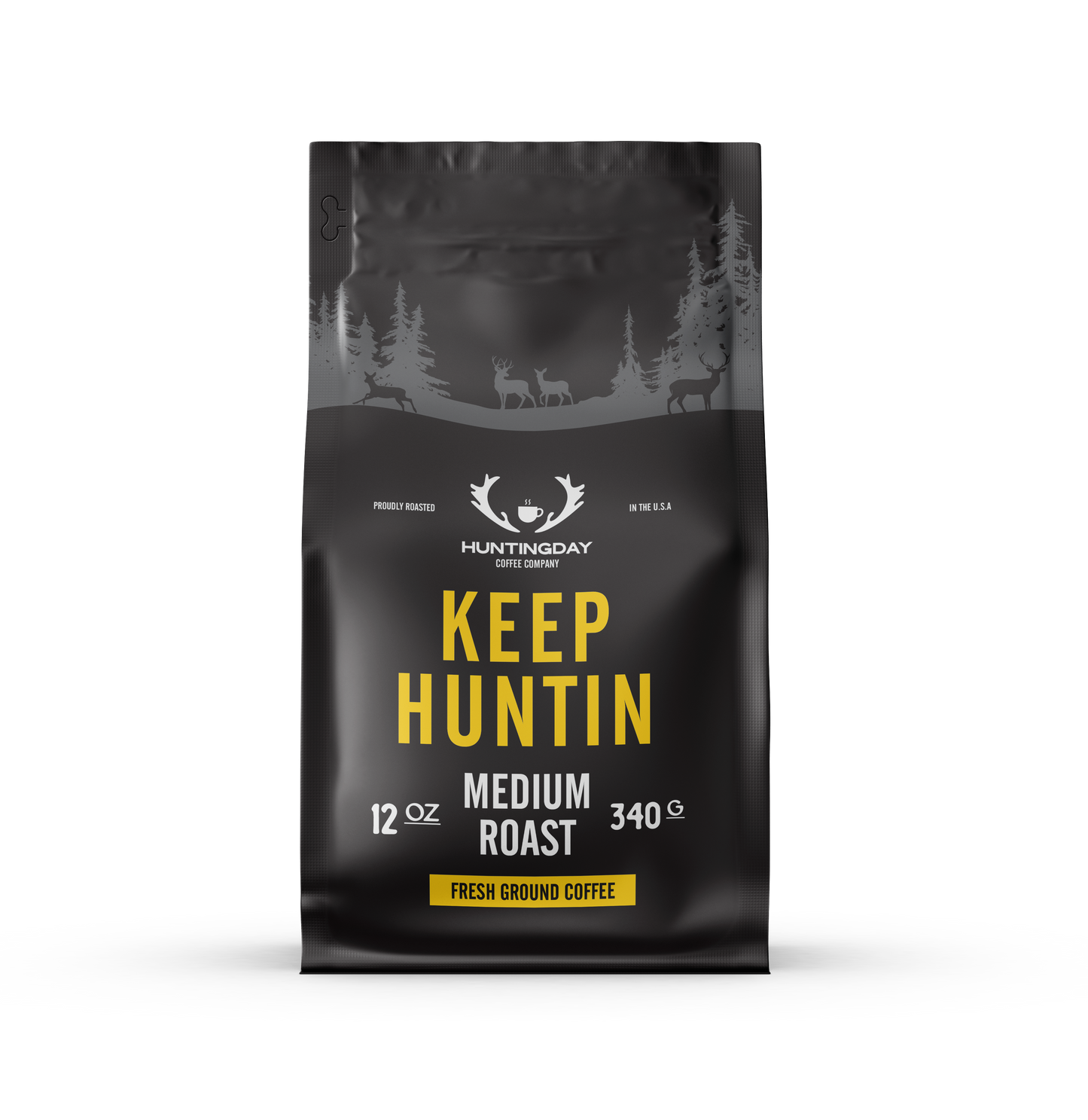 A 340g bag of Huntingday Coffee Company 'Keep Huntin' Medium Roast' coffee. The packaging is matte black with a gray forest and deer silhouette at the top, and features 'KEEP HUNTIN' in bold yellow text with 'MEDIUM ROAST' and 'FRESH GROUND COFFEE' in white and yellow below.