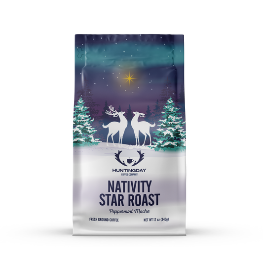 A bag of Huntingday Coffee Company Nativity Star Roast Peppermint Mocha coffee, featuring a festive winter illustration with two white deer, snow-covered pine trees, and a starry night sky on a white background.